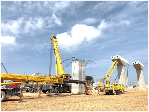 兰州新区G341线立交工程完成首片预制盖梁吊装-兰州新区AB娱乐集团门户网站